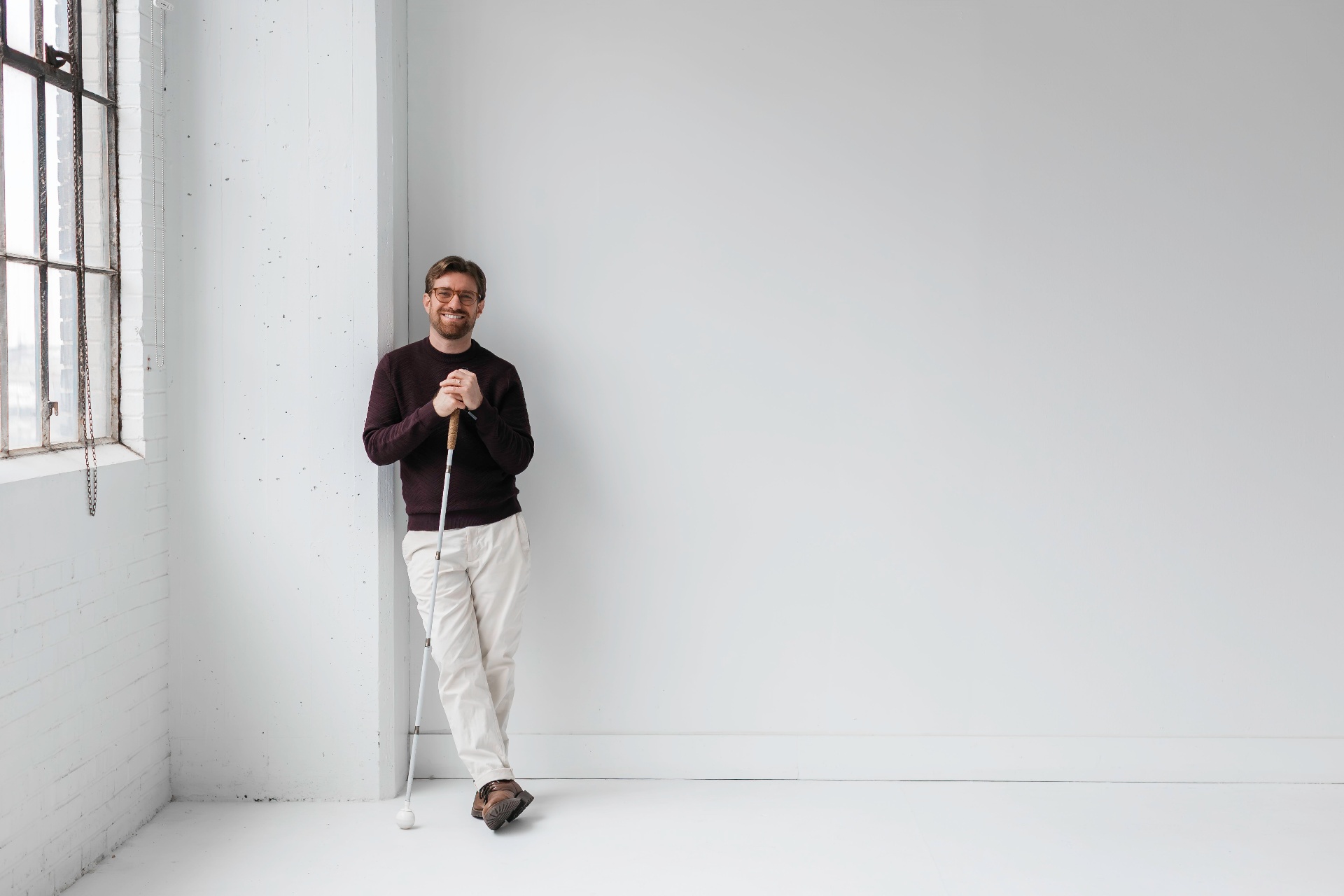 Charlie standing with his cane